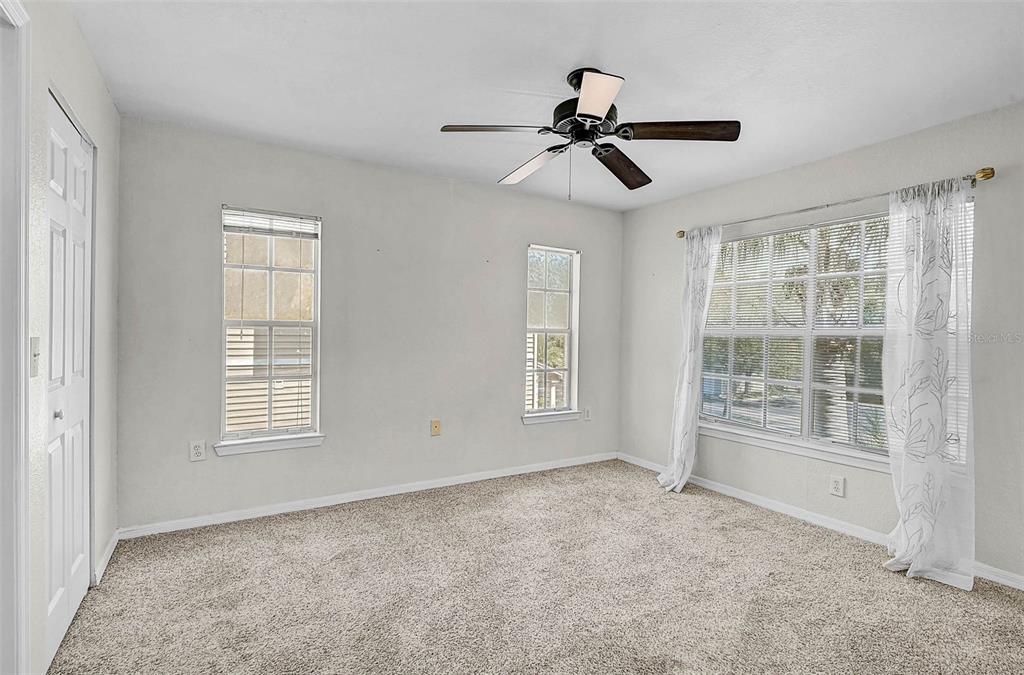 8827 Manor Loop, Unit 204 Lakewood Ranch, FL 34202 - Photo 11 of 31 a view of an empty room with a window
