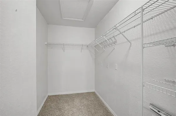 a view of a room with racks on the wall