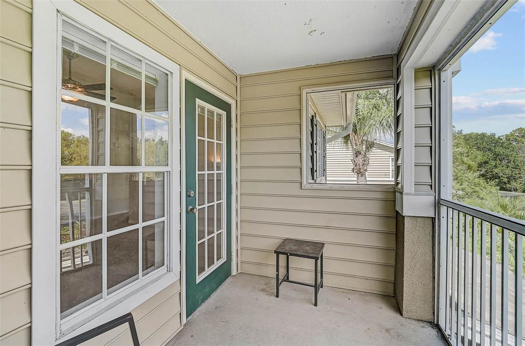 8827 Manor Loop, Unit 204 Lakewood Ranch, FL 34202 - Photo 23 of 31 a view of a balcony with a barbeque