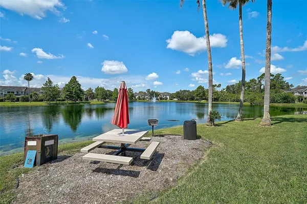 a garden view with a lake view