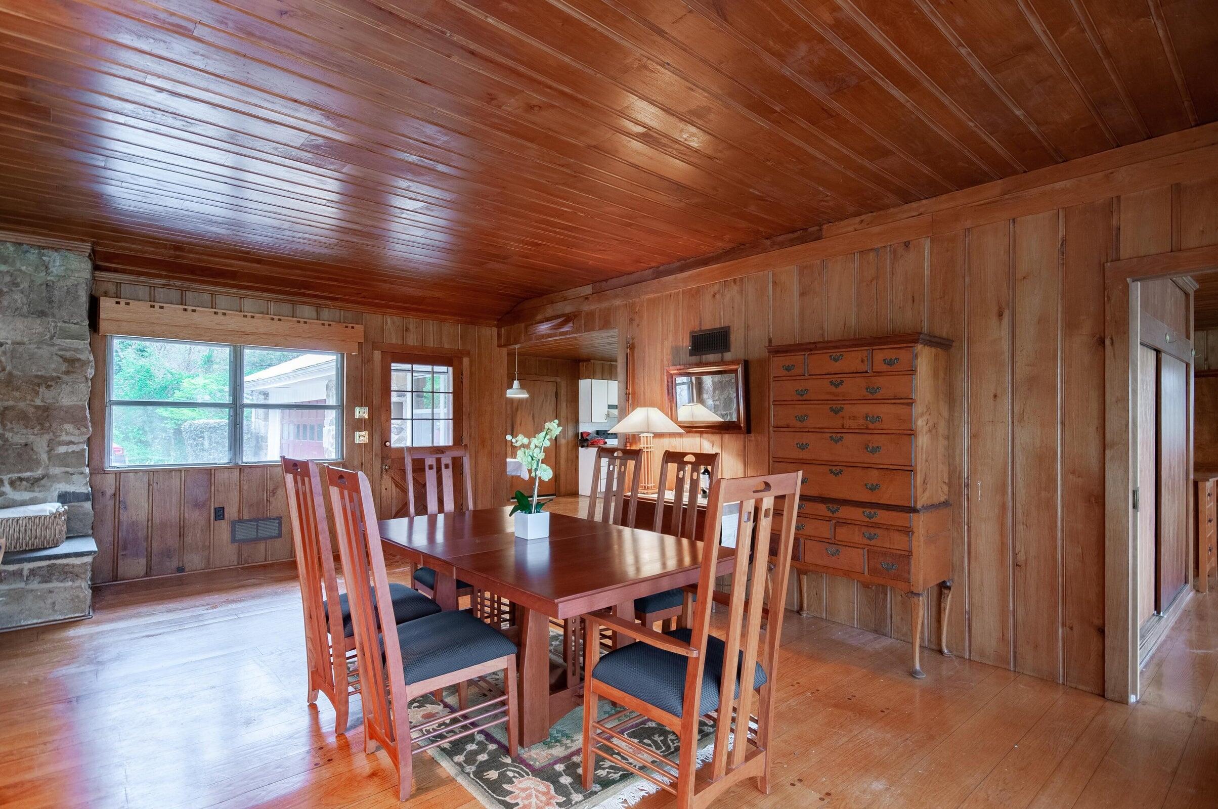 386 Fredericksburg Road Lexington, VA 24450 - Photo 16 of 72 a view of a dining room with furniture window and wooden floor