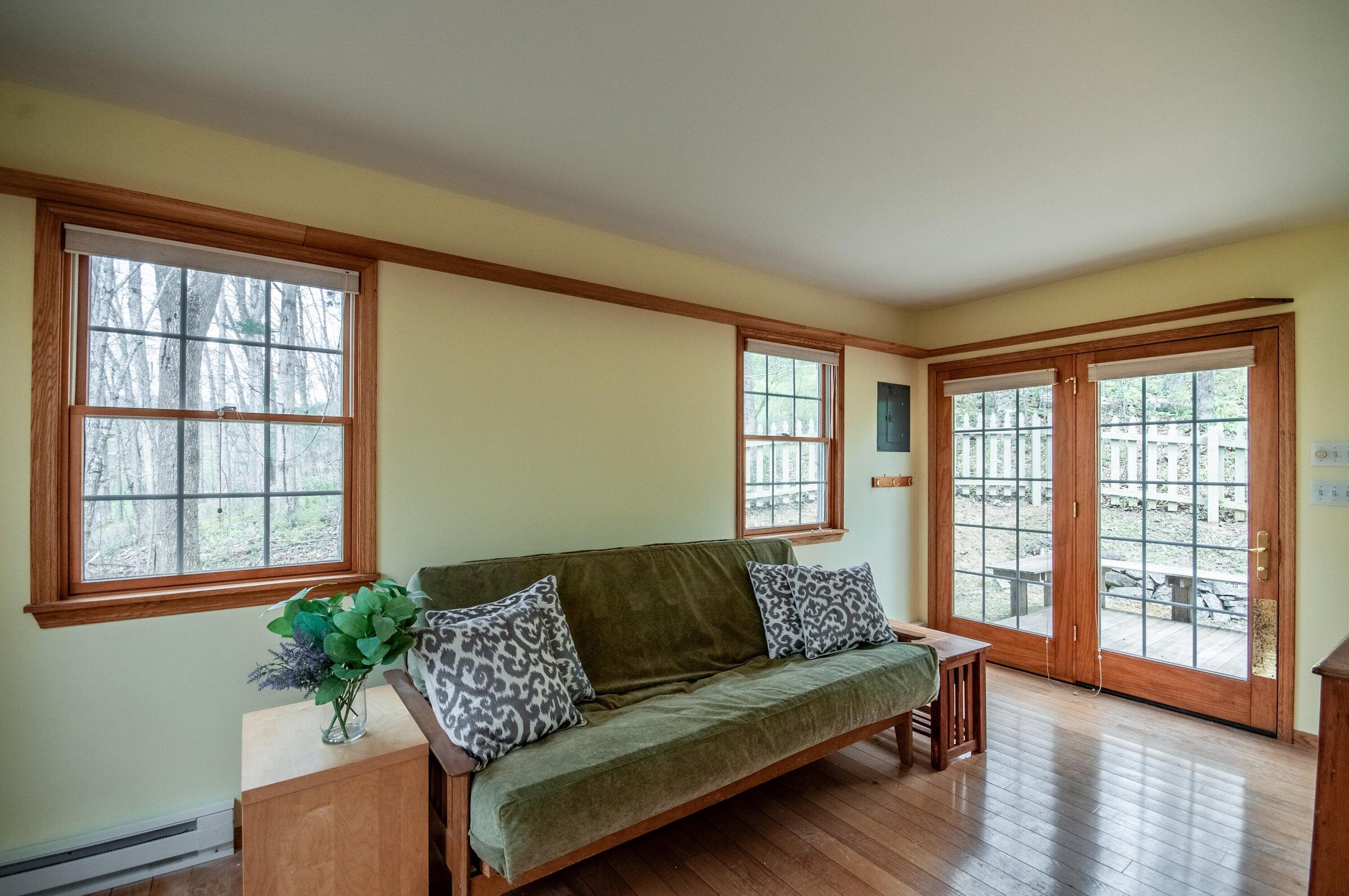 386 Fredericksburg Road Lexington, VA 24450 - Photo 47 of 72 a living room with furniture and a large window