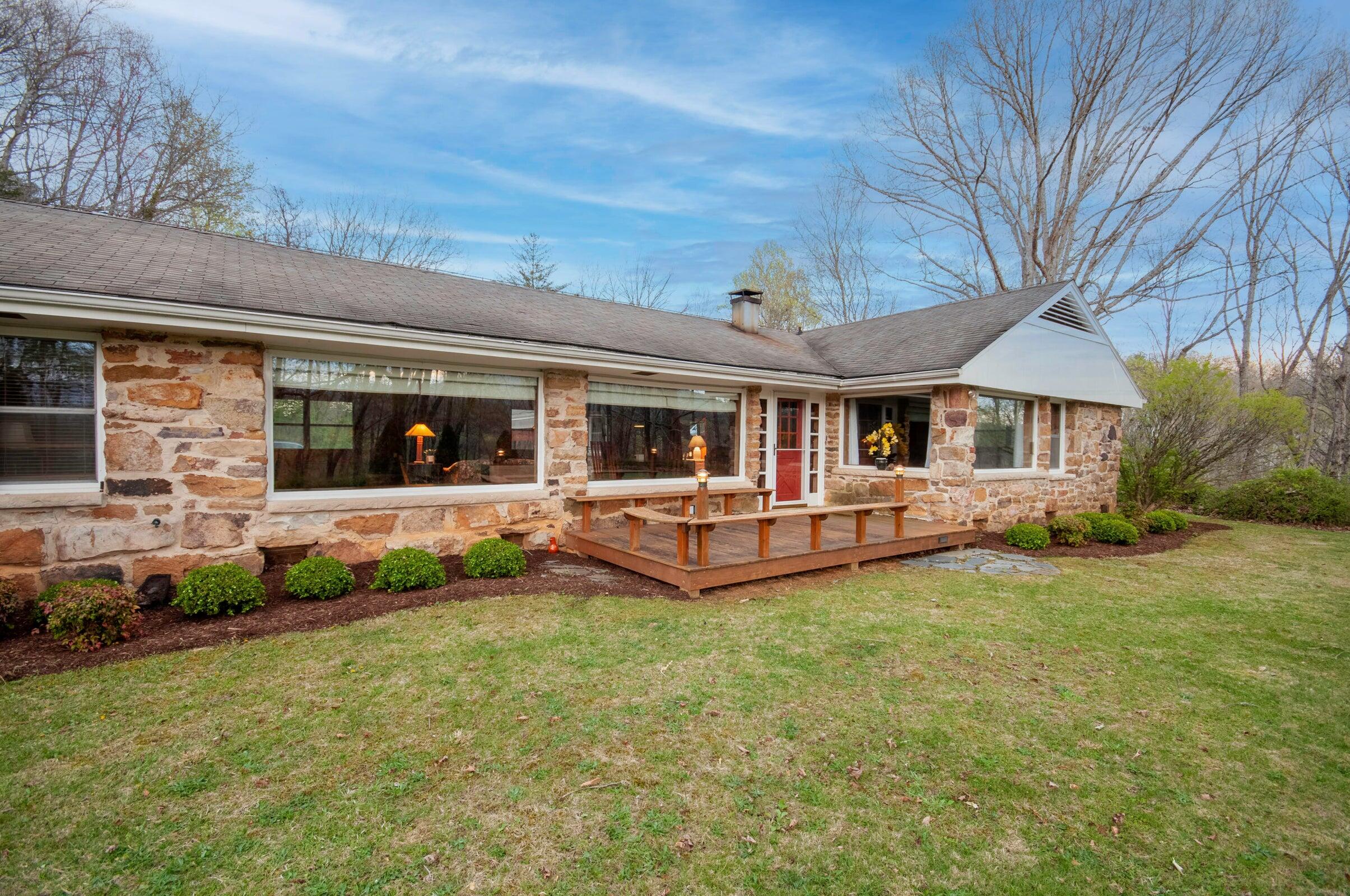 386 Fredericksburg Road Lexington, VA 24450 - Photo 5 of 72 a view of a house with a yard and sitting area