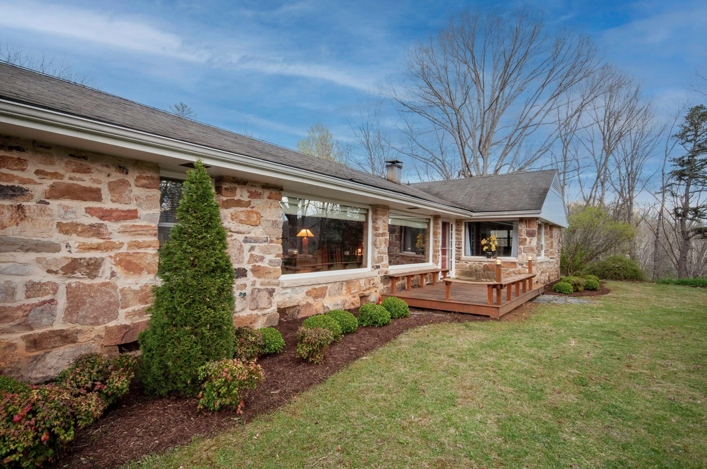 386 Fredericksburg Road Lexington, VA 24450 - Photo 6 of 72 a front view of a house with garden