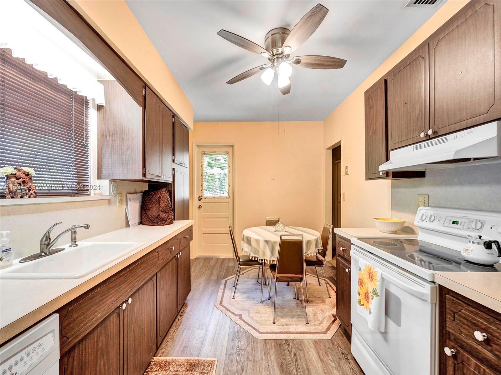 211 Southwest 24th Road Miami, FL 33129 - Photo 13 of 32 a view of a kitchen counter space a sink and appliances