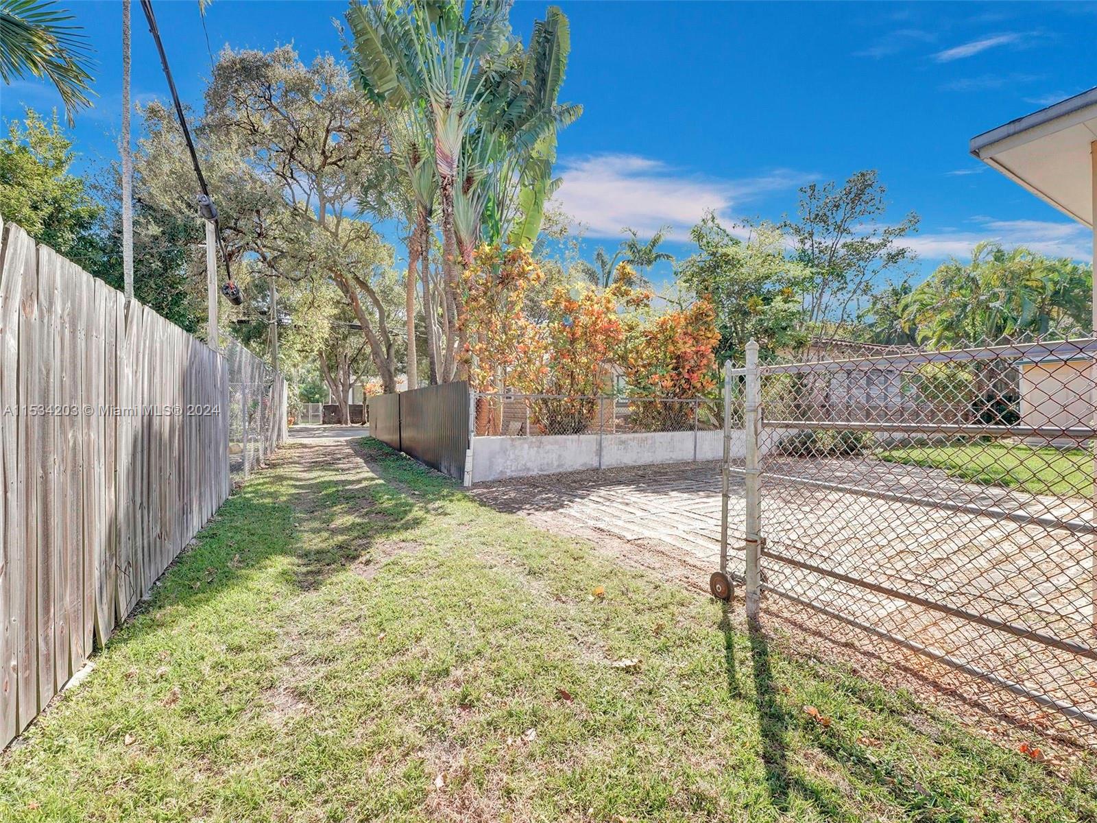 211 Southwest 24th Road Miami, FL 33129 - Photo 29 of 32 a view of a yard with flower plants