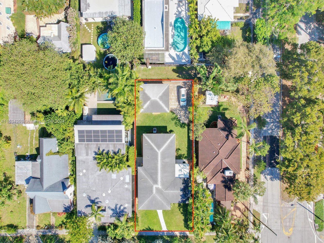 211 Southwest 24th Road Miami, FL 33129 - Photo 4 of 32 an aerial view of a residential apartment building with swimming pool