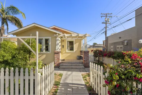 a front view of a house with a porch