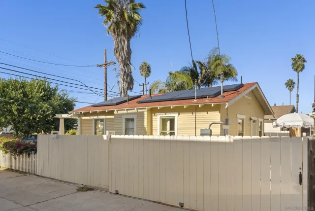 a house view with a garden space