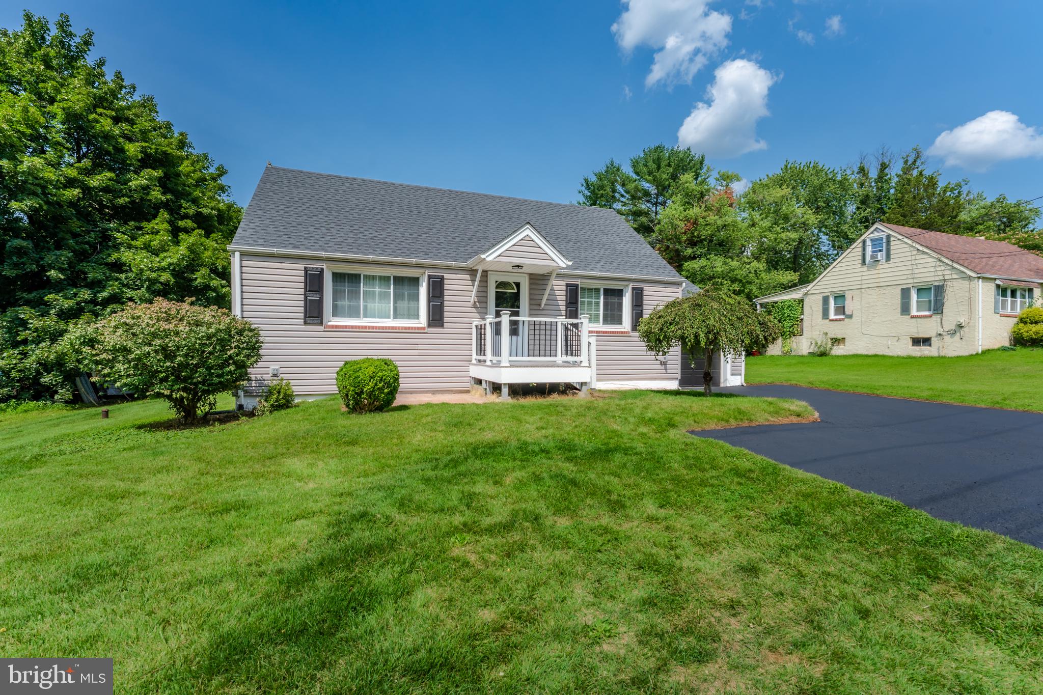 955 Bridge Road Collegeville, PA 19426 - Photo 2 of 71 Charming home with lush greenery.