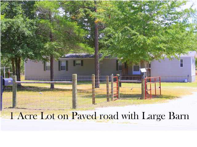 246 Long Road DeFuniak Springs, FL 32433 - Photo 1 of 19 a view of swimming pool with an outdoor seating