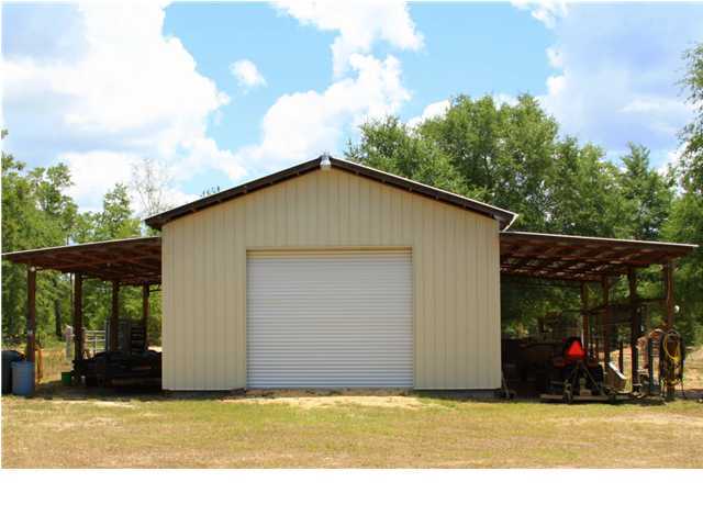 246 Long Road DeFuniak Springs, FL 32433 - Photo 15 of 19 a view of outdoor space garage and yard