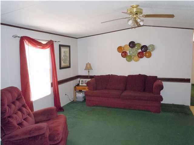 246 Long Road DeFuniak Springs, FL 32433 - Photo 5 of 19 a living room with furniture and a window