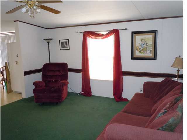 246 Long Road DeFuniak Springs, FL 32433 - Photo 6 of 19 a living room with furniture and a window