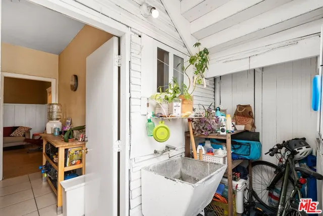 a view of a living room and bathroom