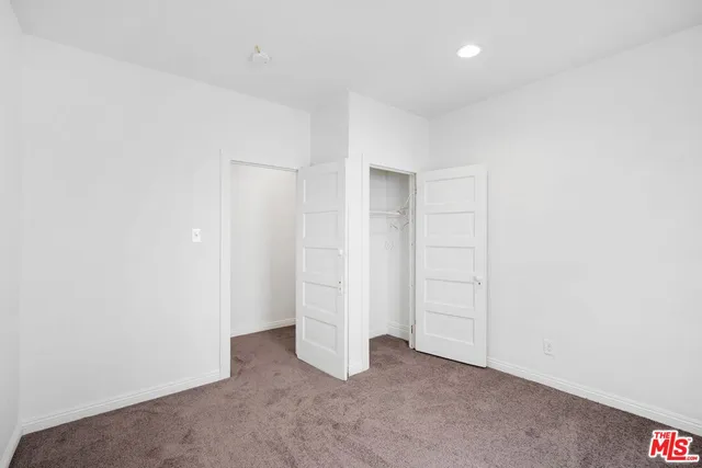 an empty room with closet