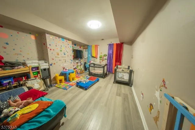 a view of game room with lots of stuff