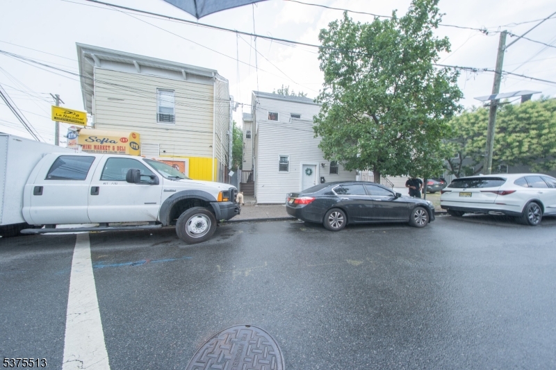 56 North York Street Paterson, NJ 07524 - Photo 20 of 20 a view of cars parked in a parking lot