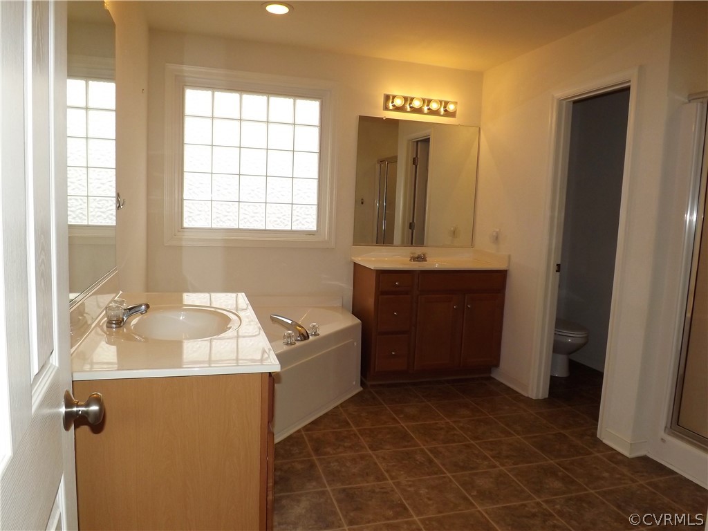 4221 Cameron Road Hopewell, VA 23860 - Photo 11 of 16 The elegant Master Bath is ensuite with the Master