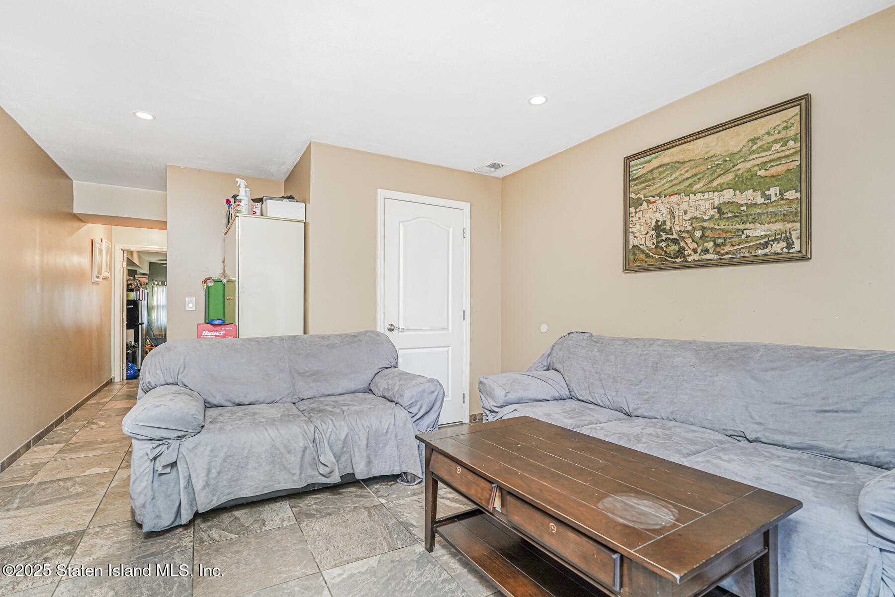31 Plank Road Staten Island, NY 10314 - Photo 20 of 30 a living room with furniture and a couch