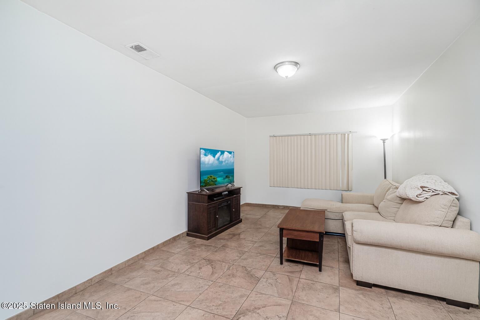 31 Plank Road Staten Island, NY 10314 - Photo 29 of 30 a living room with furniture