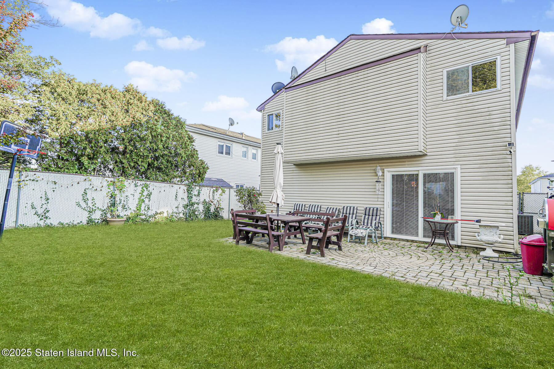 31 Plank Road Staten Island, NY 10314 - Photo 3 of 30 a view of a house with backyard and sitting area