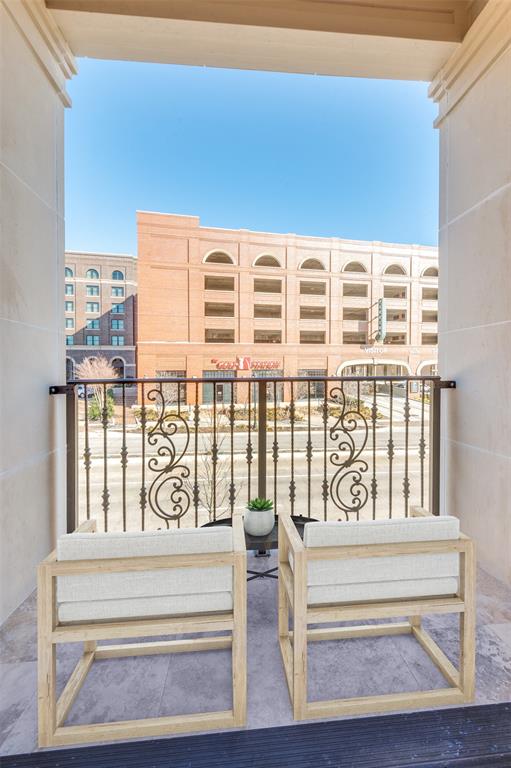 250 East Dallas Road, Unit 124 Grapevine, TX 76051 - Photo 21 of 37 Staged balcony off kitchen, great place to enjoy morning coffee
