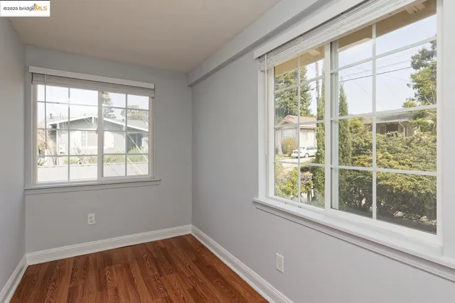 a view of a room with a large window