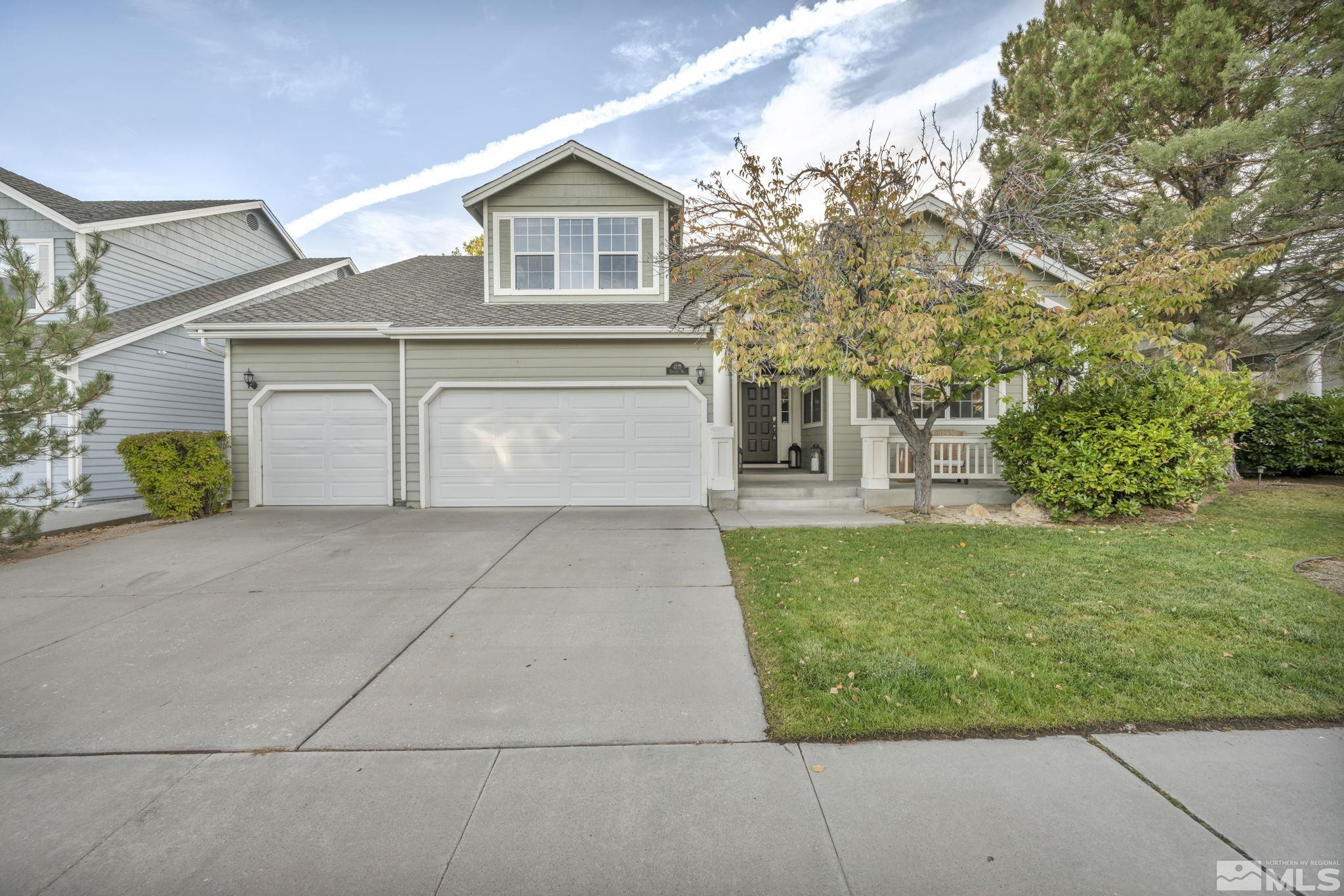 4731 Ellicott Way Reno, NV 89519 - Photo 1 of 36 a front view of a house with garden