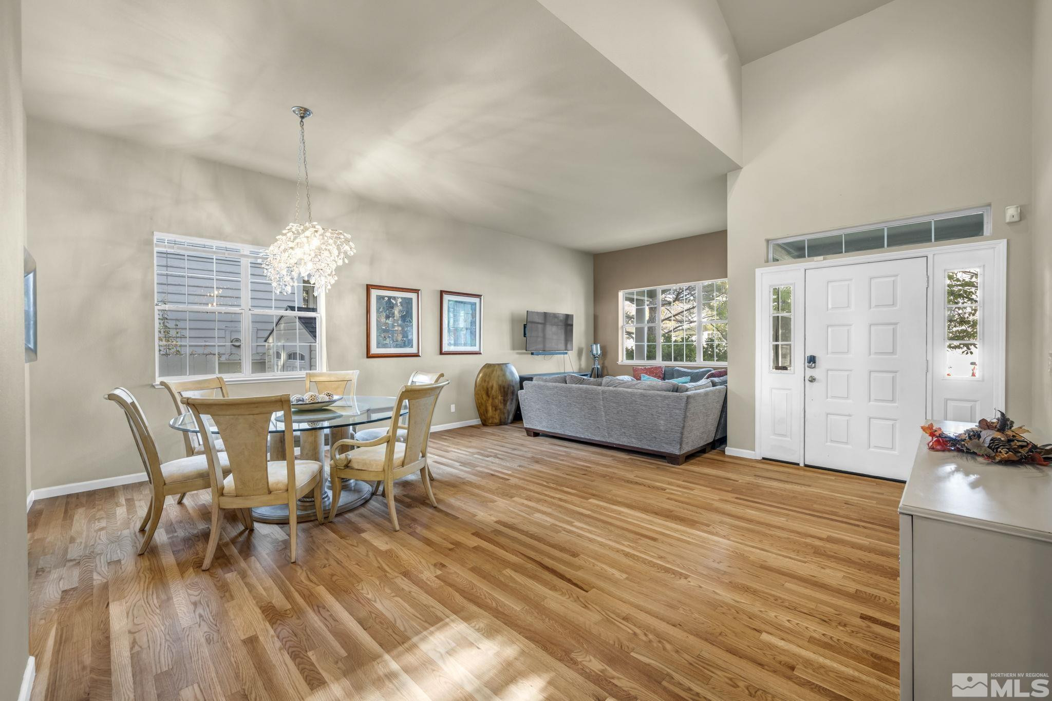 4731 Ellicott Way Reno, NV 89519 - Photo 13 of 36 a view of a dining room with furniture and wooden floor