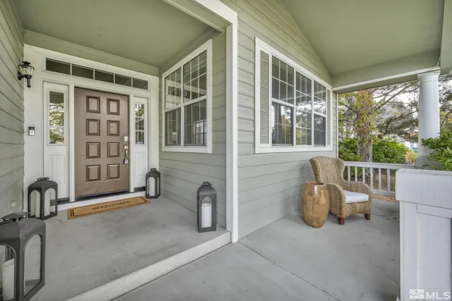 a view of a chair and table in the patio
