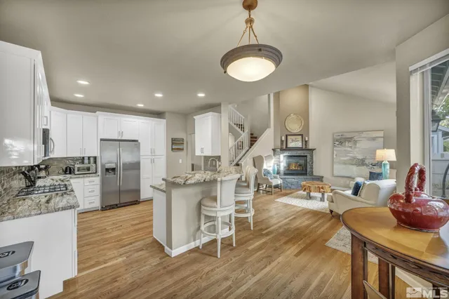 a view of a kitchen and dining room