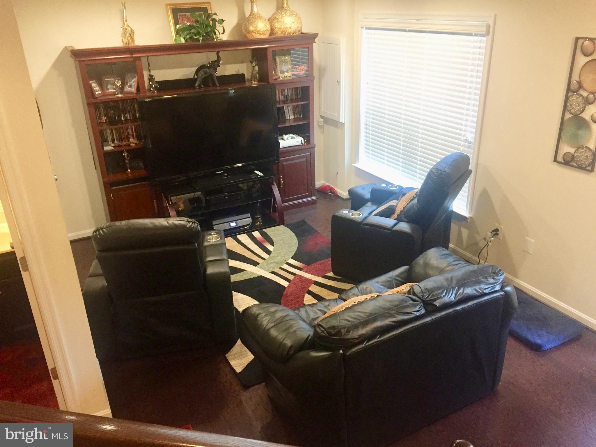 9702 Smithview Place Lanham, MD 20706 - Photo 2 of 15 Bottom level (movie room)