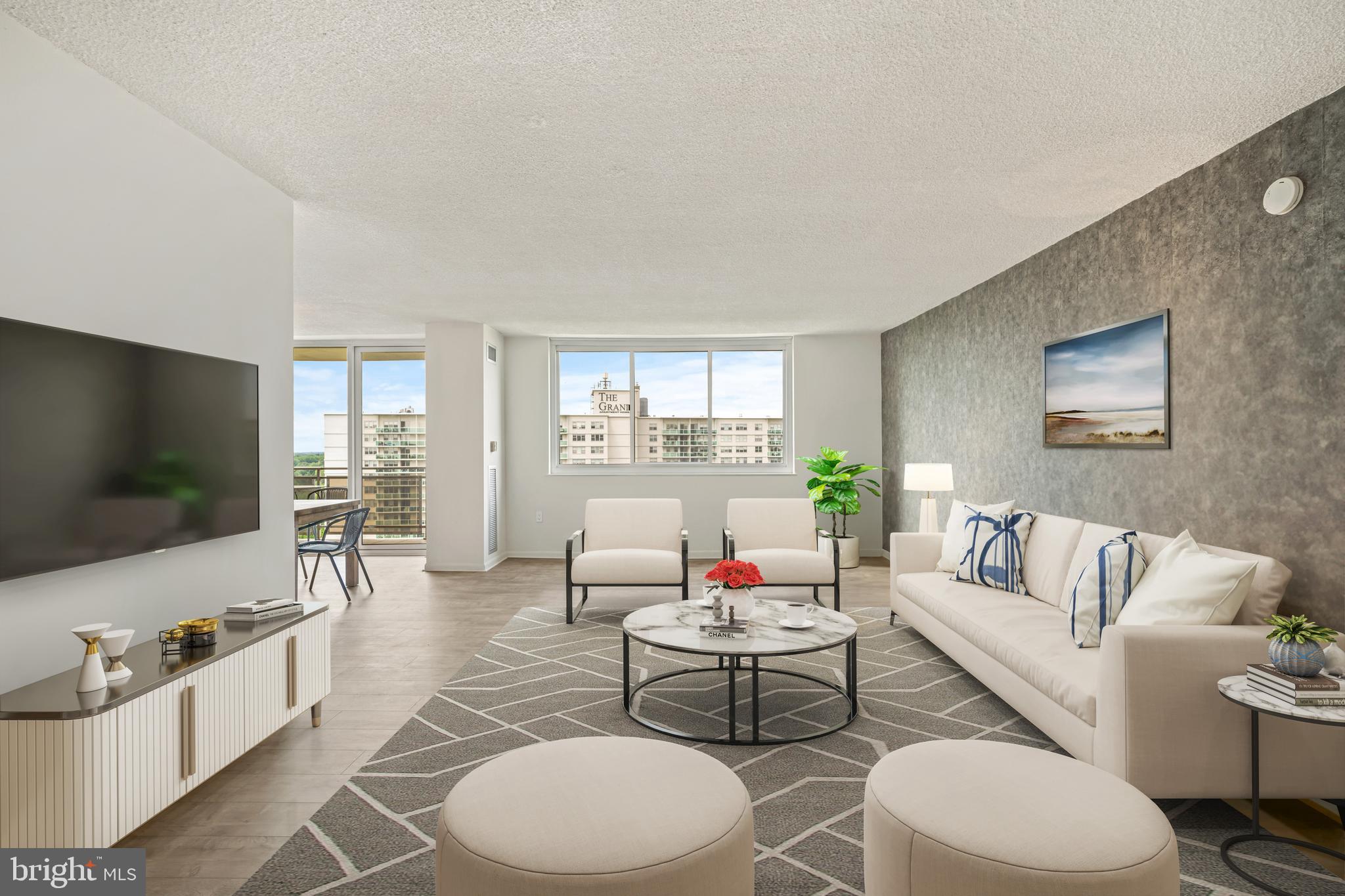 1840 Frontage Road, Unit 1501 Cherry Hill, NJ 08034 - Photo 11 of 20 a living room with furniture and a flat screen tv