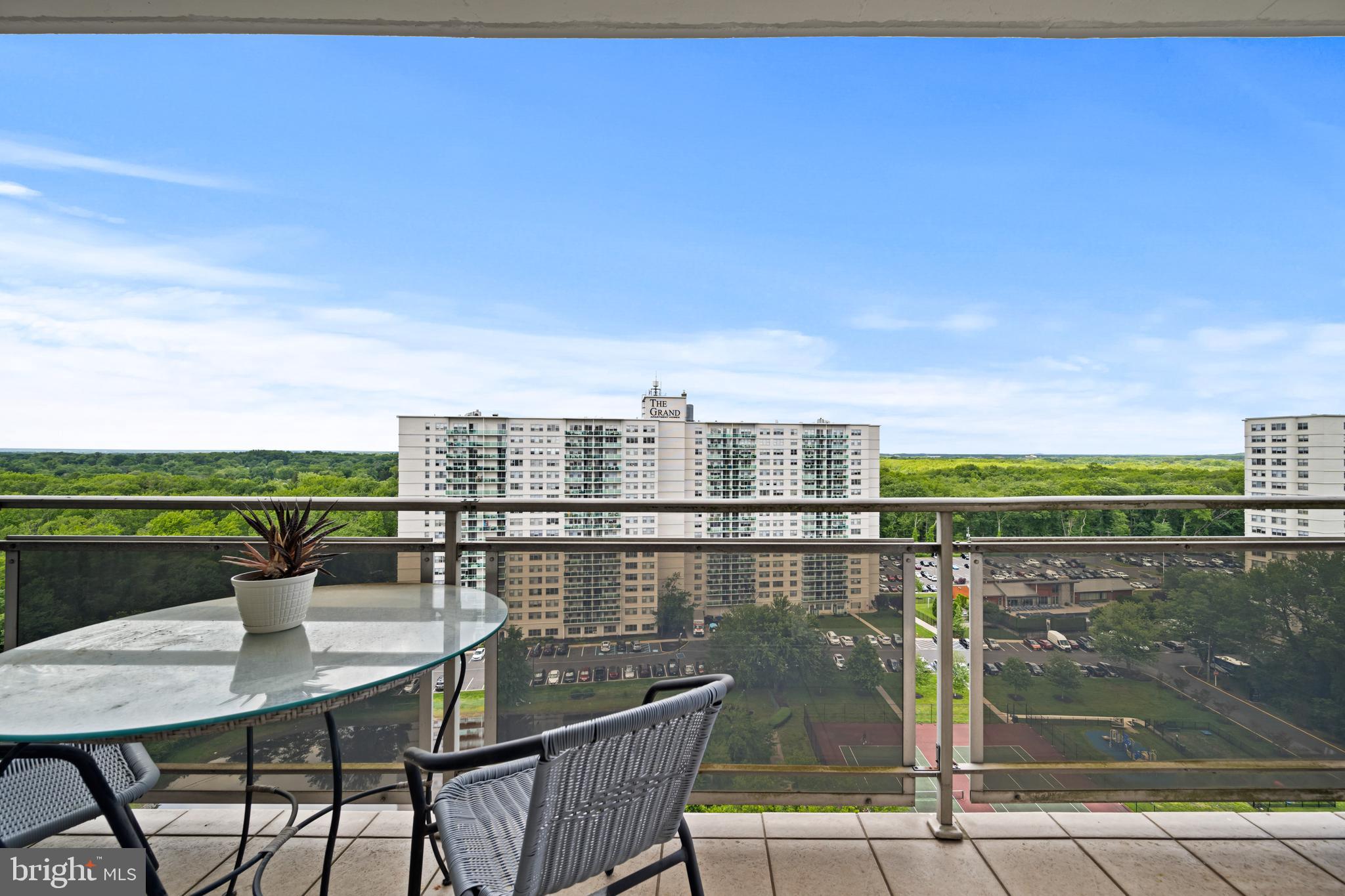 1840 Frontage Road, Unit 1501 Cherry Hill, NJ 08034 - Photo 18 of 20 a view of a chairs and table on the terrace