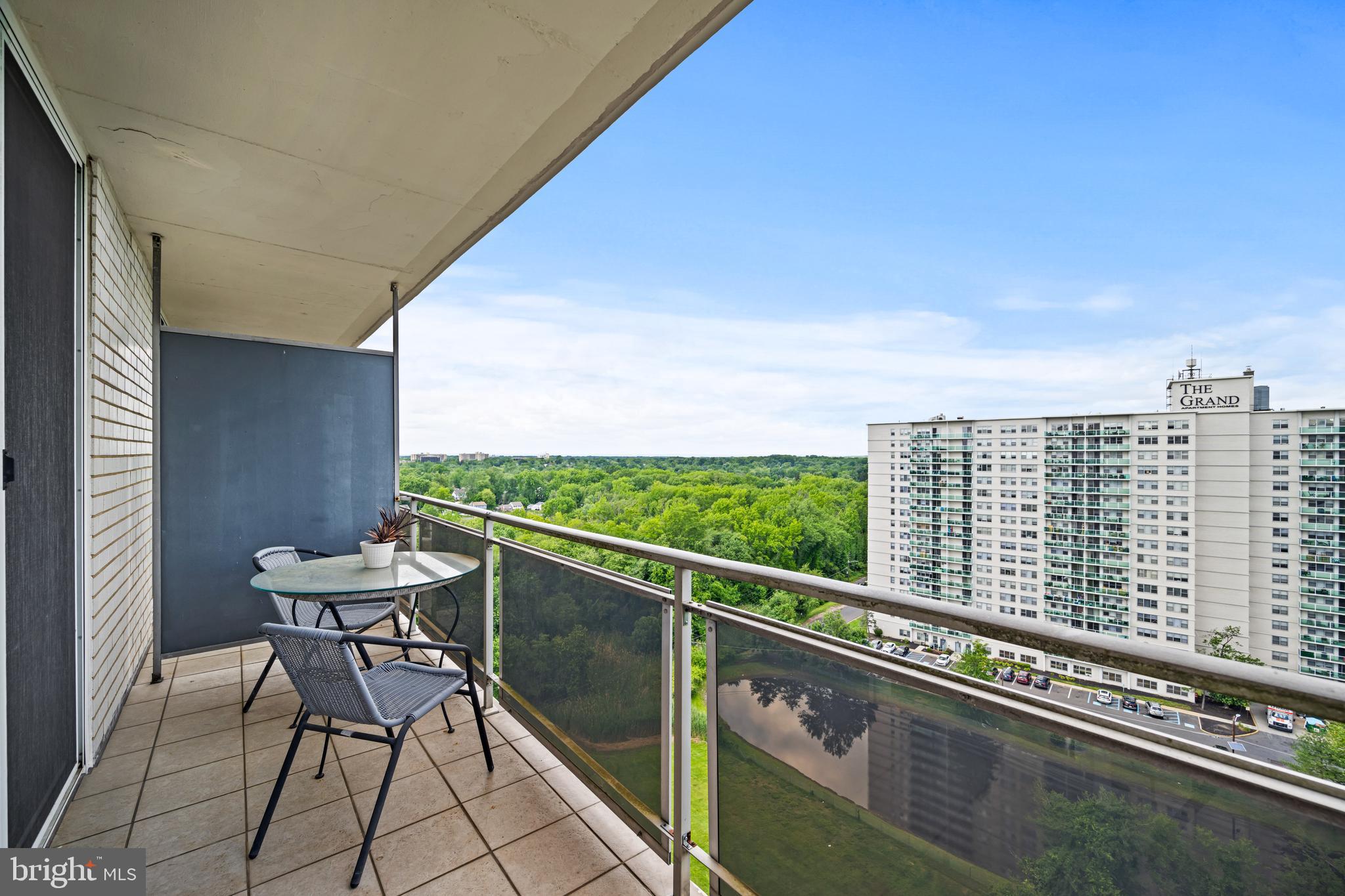 1840 Frontage Road, Unit 1501 Cherry Hill, NJ 08034 - Photo 19 of 20 a view of a balcony with chair and wooden floor
