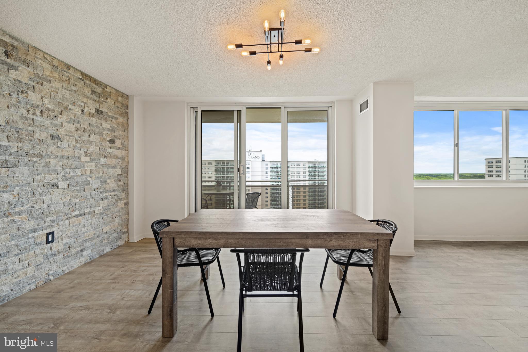 1840 Frontage Road, Unit 1501 Cherry Hill, NJ 08034 - Photo 6 of 20 a view of a dining room with furniture window and wooden floor