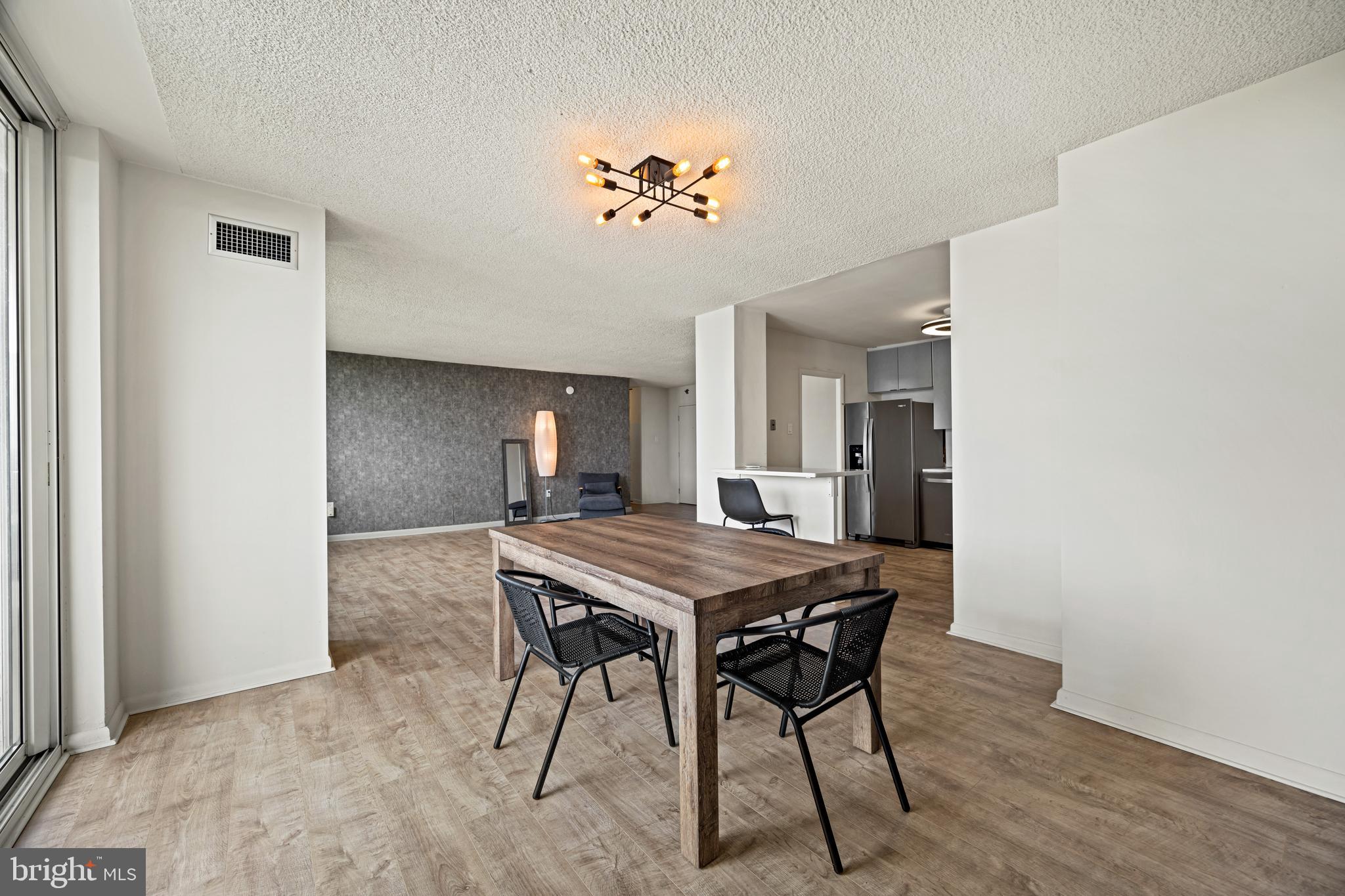 1840 Frontage Road, Unit 1501 Cherry Hill, NJ 08034 - Photo 7 of 20 a view of a dining room with furniture and window