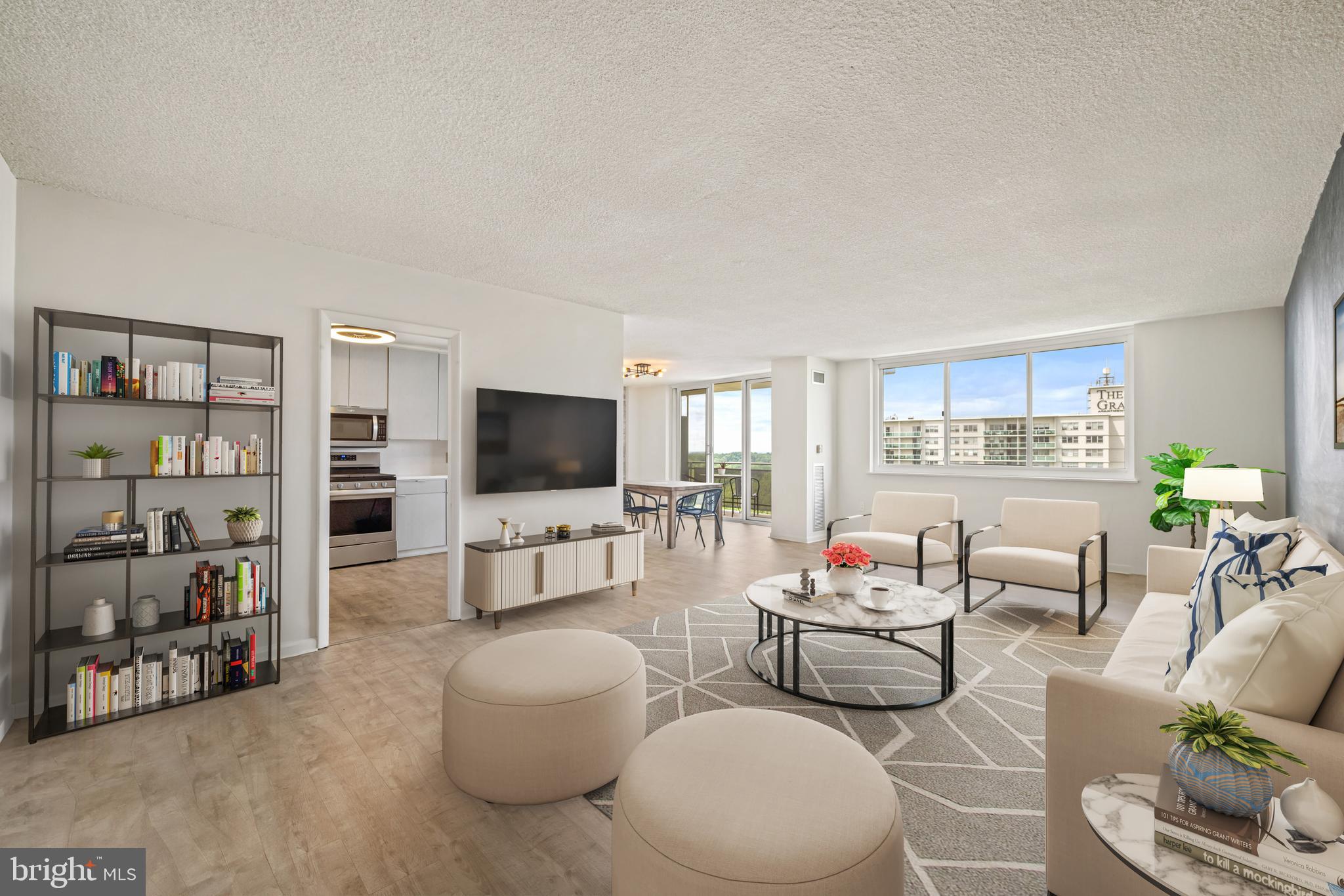 1840 Frontage Road, Unit 1501 Cherry Hill, NJ 08034 - Photo 10 of 20 a living room with furniture and a flat screen tv