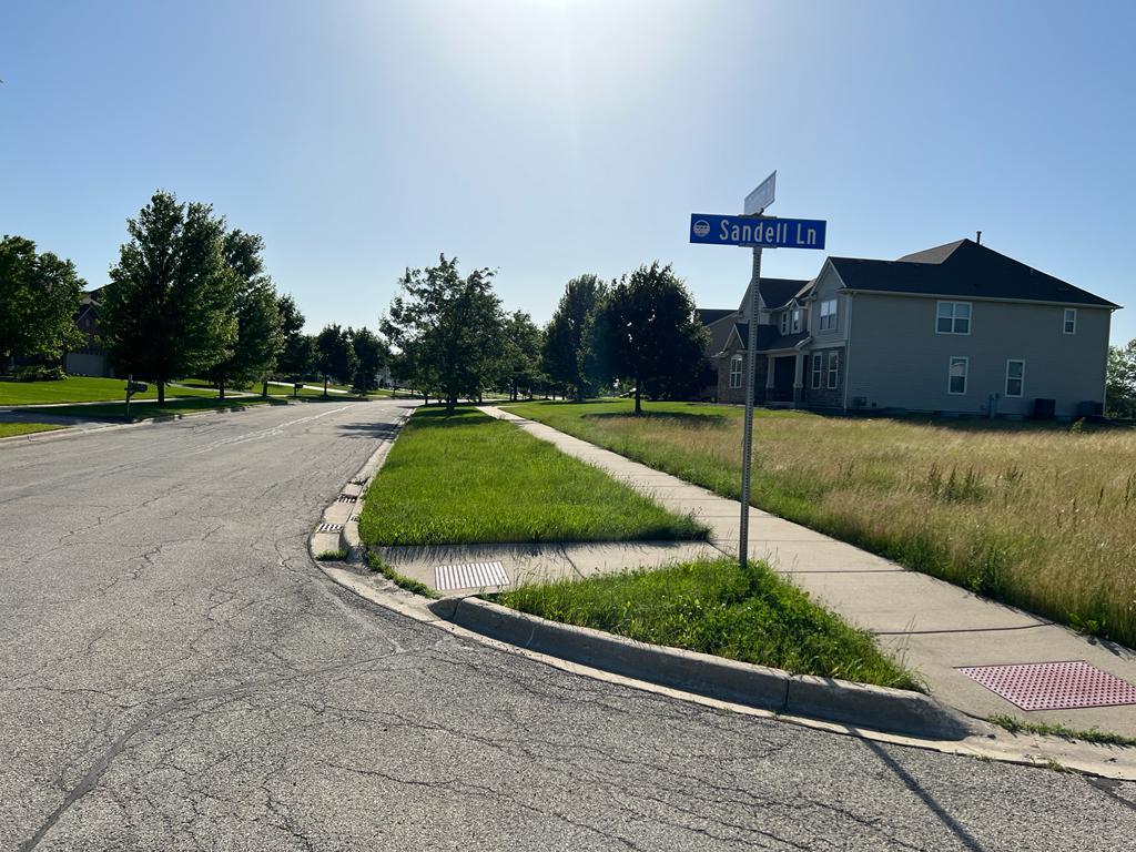 2148 Bartram Road North Aurora, IL 60542 - Photo 11 of 12 a view of a wooden fence