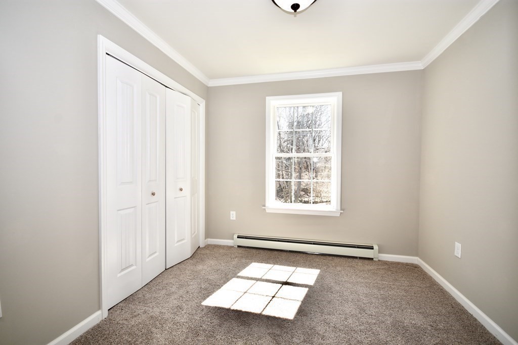 5 Woodlawn Road Freetown, MA 02702 - Photo 17 of 24 an empty room with a window
