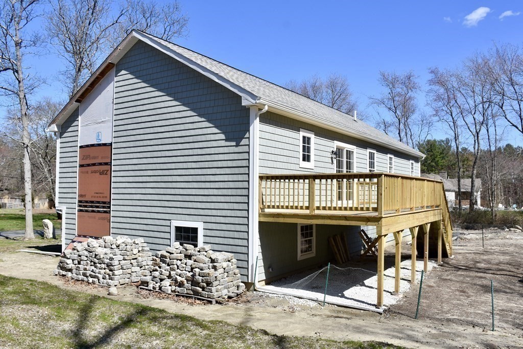5 Woodlawn Road Freetown, MA 02702 - Photo 21 of 24 a view of a house with a yard