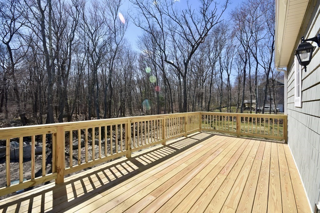 5 Woodlawn Road Freetown, MA 02702 - Photo 23 of 24 a view of balcony with wooden floor and fence