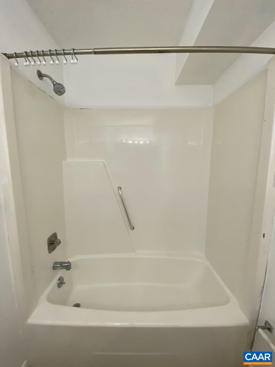 102 Turtle Creek Road, Unit 1 Charlottesville, VA 22901 - Photo 20 of 26 a bathroom with a shower and a bath tub