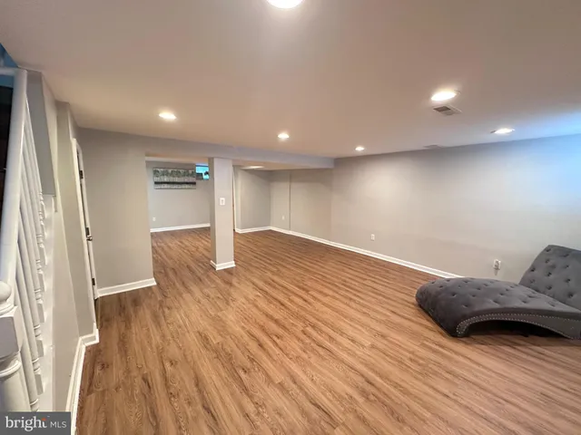 a view of livingroom with furniture and wooden floor