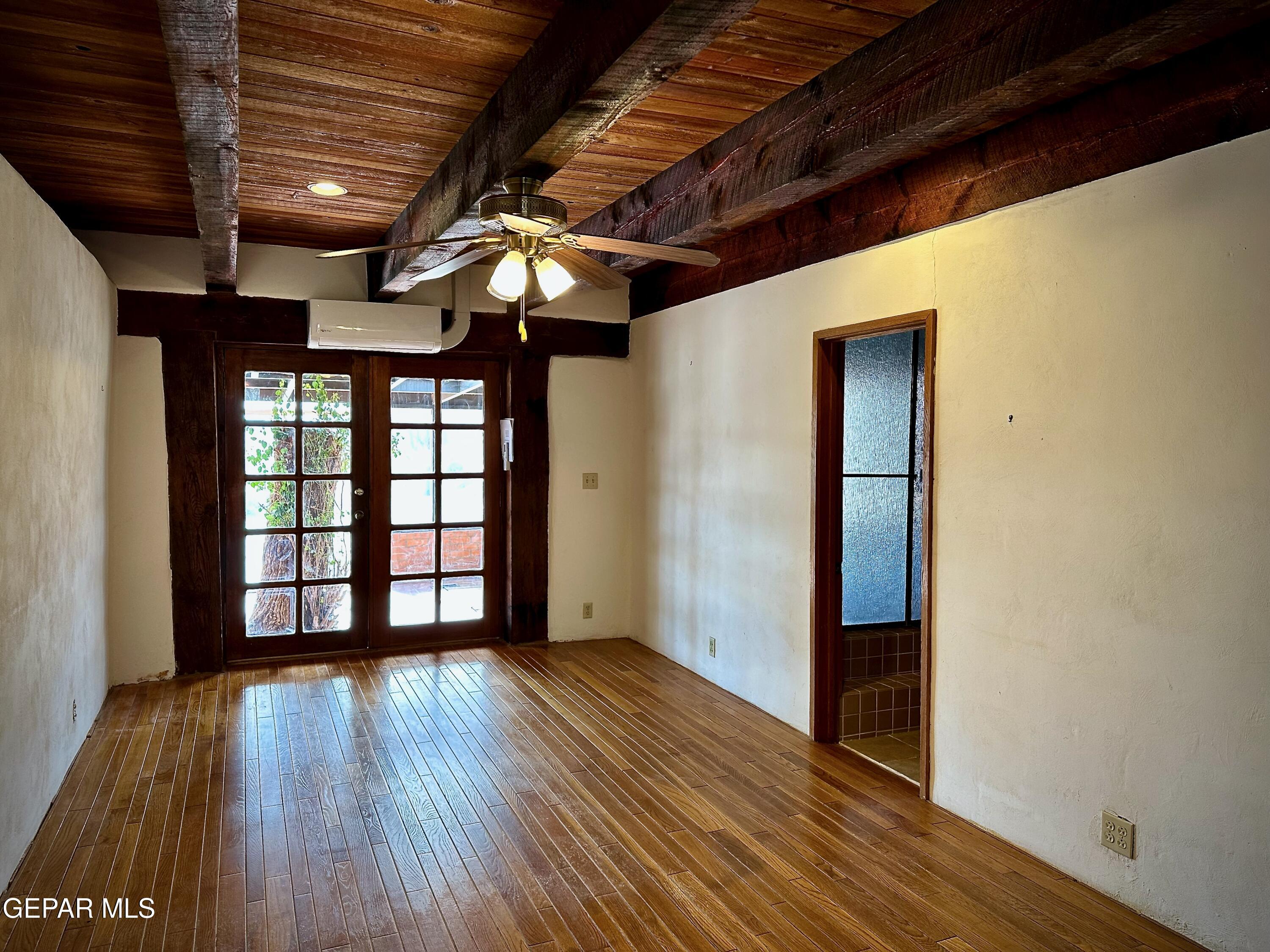 1095 Little Road Anthony, NM 88021 - Photo 14 of 30 a view of empty room with wooden floor
