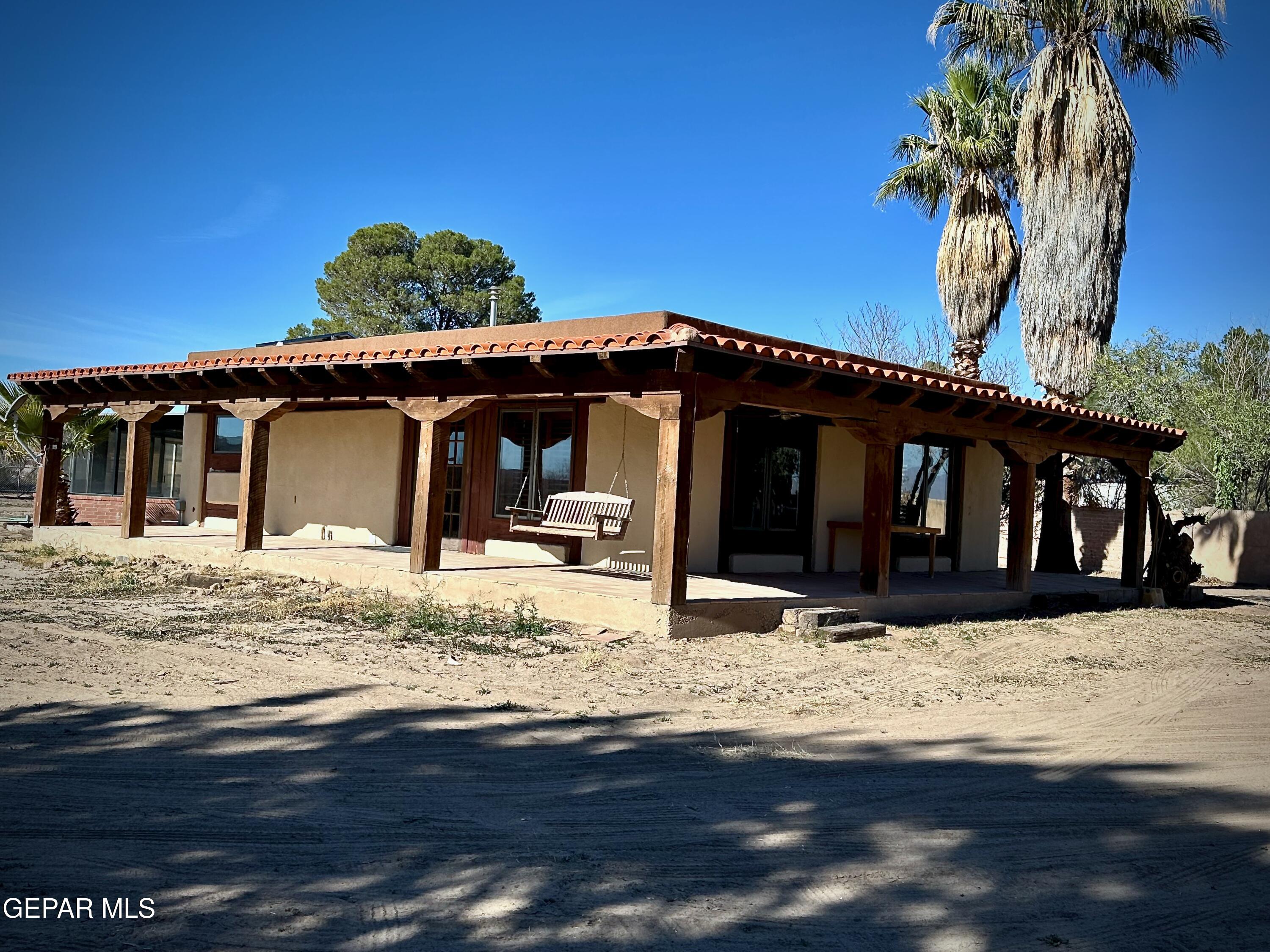 1095 Little Road Anthony, NM 88021 - Photo 20 of 30 a view of a house with snow on the road