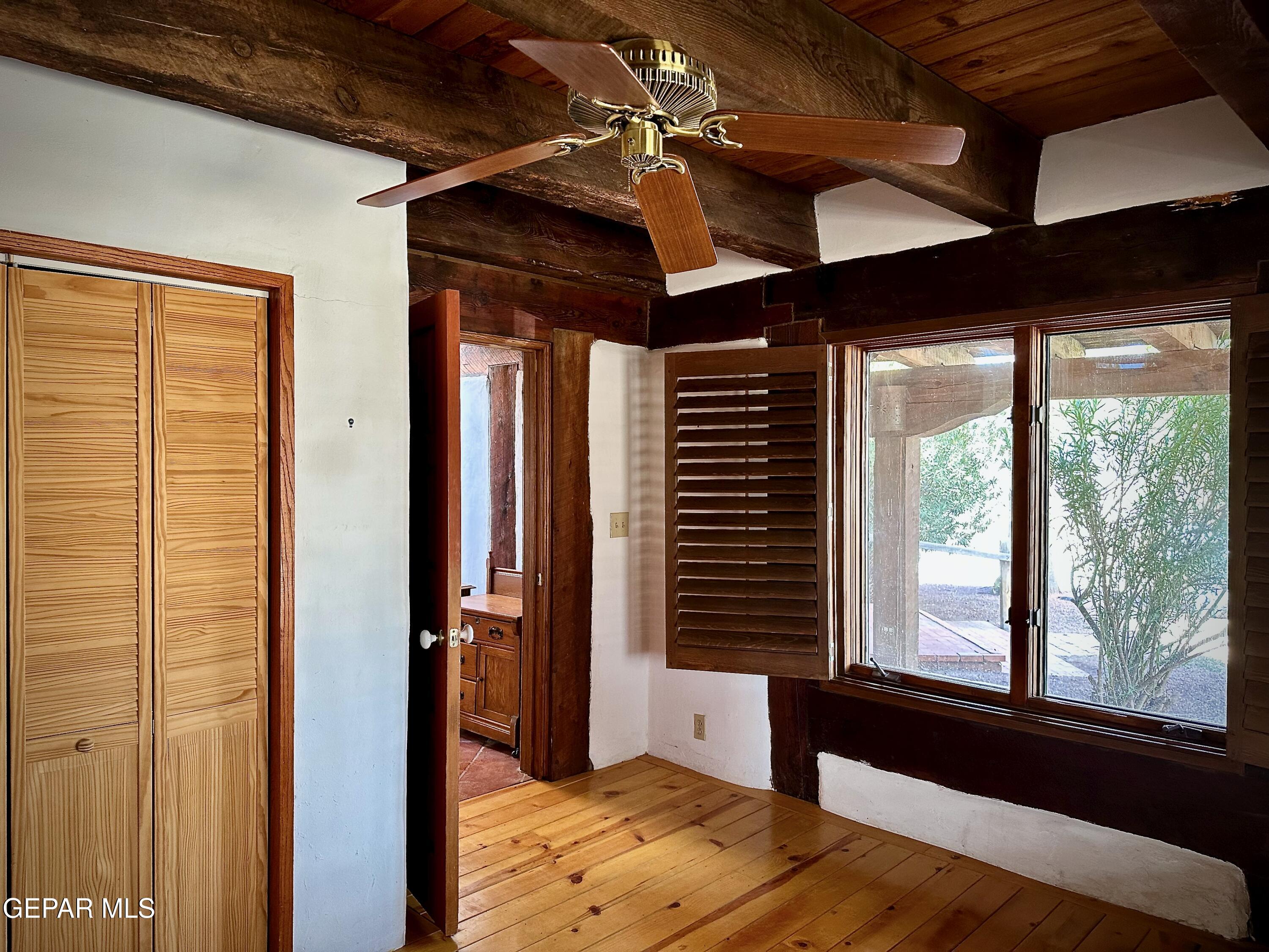 1095 Little Road Anthony, NM 88021 - Photo 9 of 30 a bed room with a bed and a large window