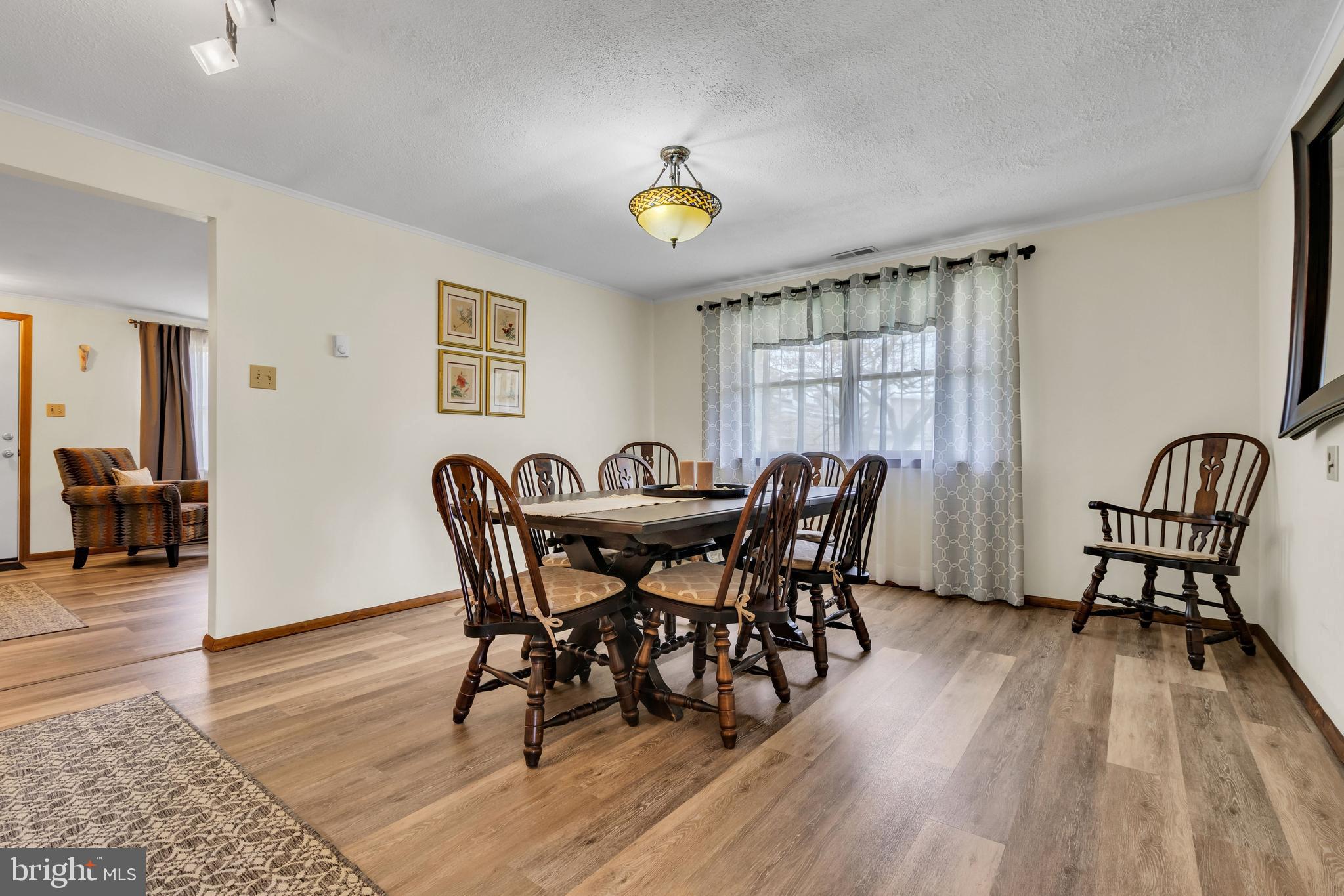 33 Poplar Street Sicklerville, NJ 08081 - Photo 12 of 62 a view of a a dining room with furniture window and wooden floor