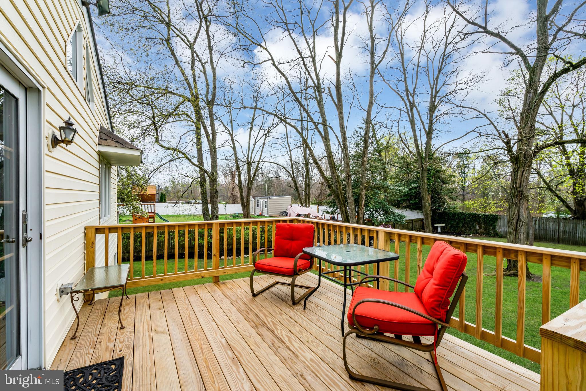 33 Poplar Street Sicklerville, NJ 08081 - Photo 48 of 62 a view of sitting area with furniture on wooden deck